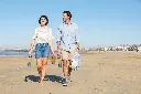 JPG-R_BC151EUNV_InUse_Denim_2People_Walking_OnBeach.webp