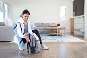 JPG-R_BC251EULD_InUse_LivingRoom_VesselBackpack_Woman.webp