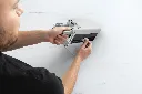 DAT-K62006EUUKWH_InUse_Sharpening_OverHead_Man_2_35mm CMYK.webp