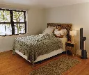 JPG-R_TF200SEU_InUse_BedRoom_Vertical_Reading_Man_Right.webp