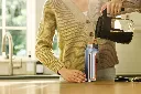 JPG-R_DW1603EUUKNV_InUse_Kitchen_Woman_Pouring_Coffee_Cutaway.webp