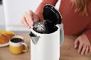 JPG-KT200EUWH_White Kettle_Ktichen_Woman_Filter_Remove_RT.webp