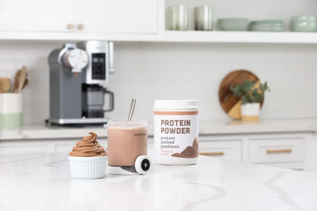 JPG-R_NC701EU_InUse_Kitchen_OnIsland_LineUp_Protein_Powder.webp